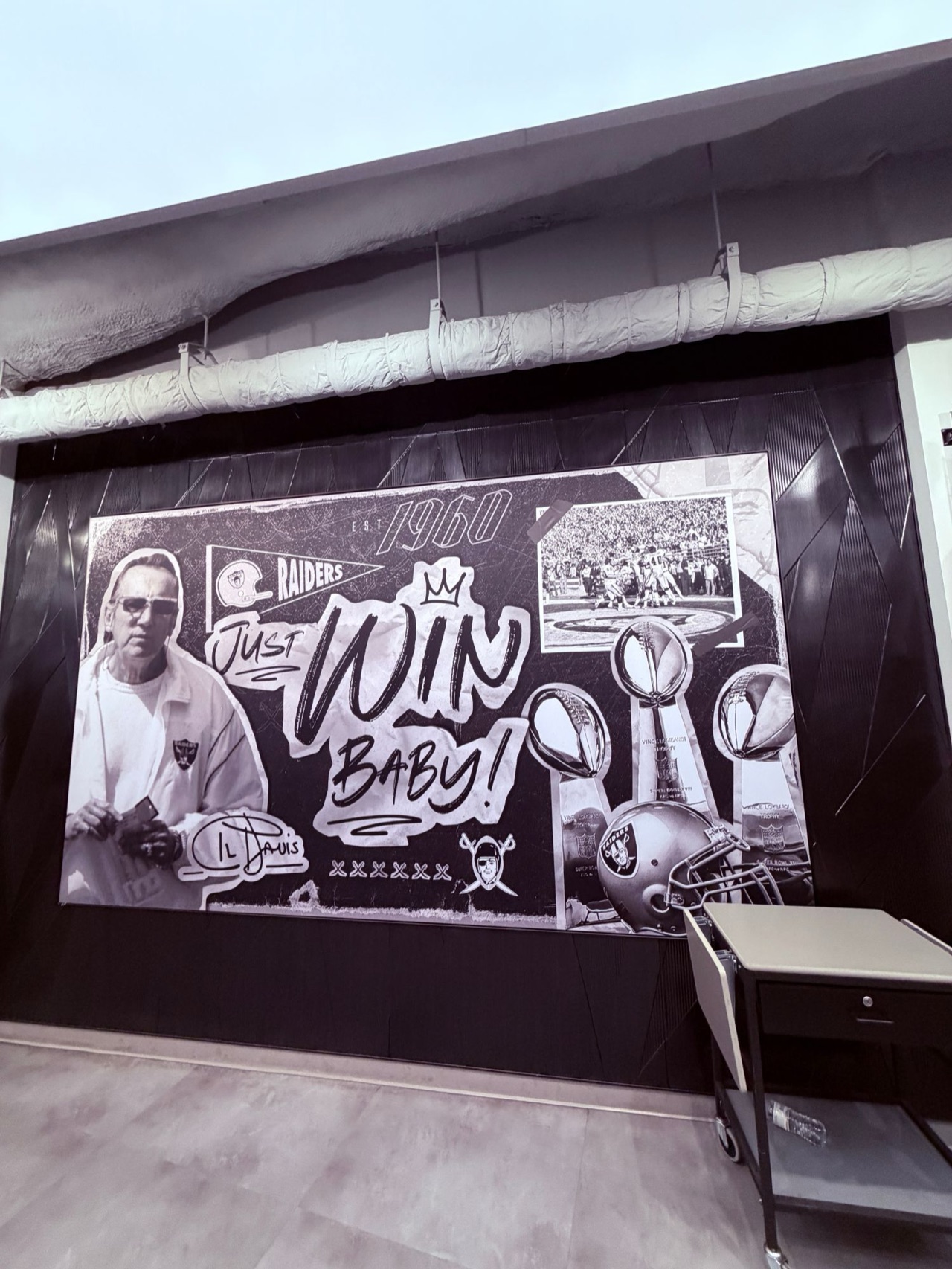 Las Vegas Raiders wall and glass graphics — "Just Win Baby" player wall, Al Davis mural and Alumni section glass graphics at Allegiant Stadium — Las Vegas, NV