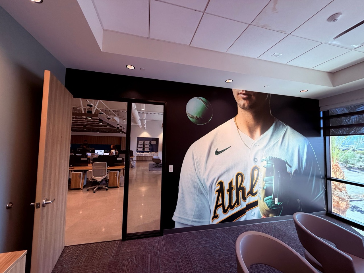 Las Vegas Raiders wall and glass graphics — "Just Win Baby" player wall, Al Davis mural and Alumni section glass graphics at Allegiant Stadium — Las Vegas, NV