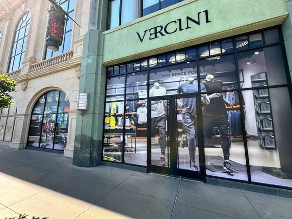 Vercini storefront — Retail window & signage graphics