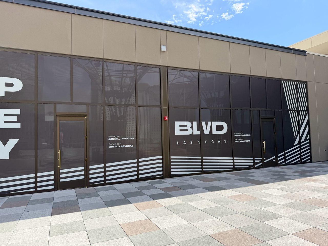 BLVD Las Vegas storefront with black and white window graphics