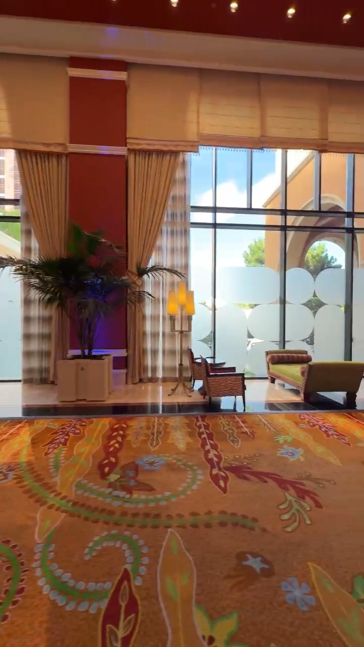 Video of decorative frosted window film across a resort lobby