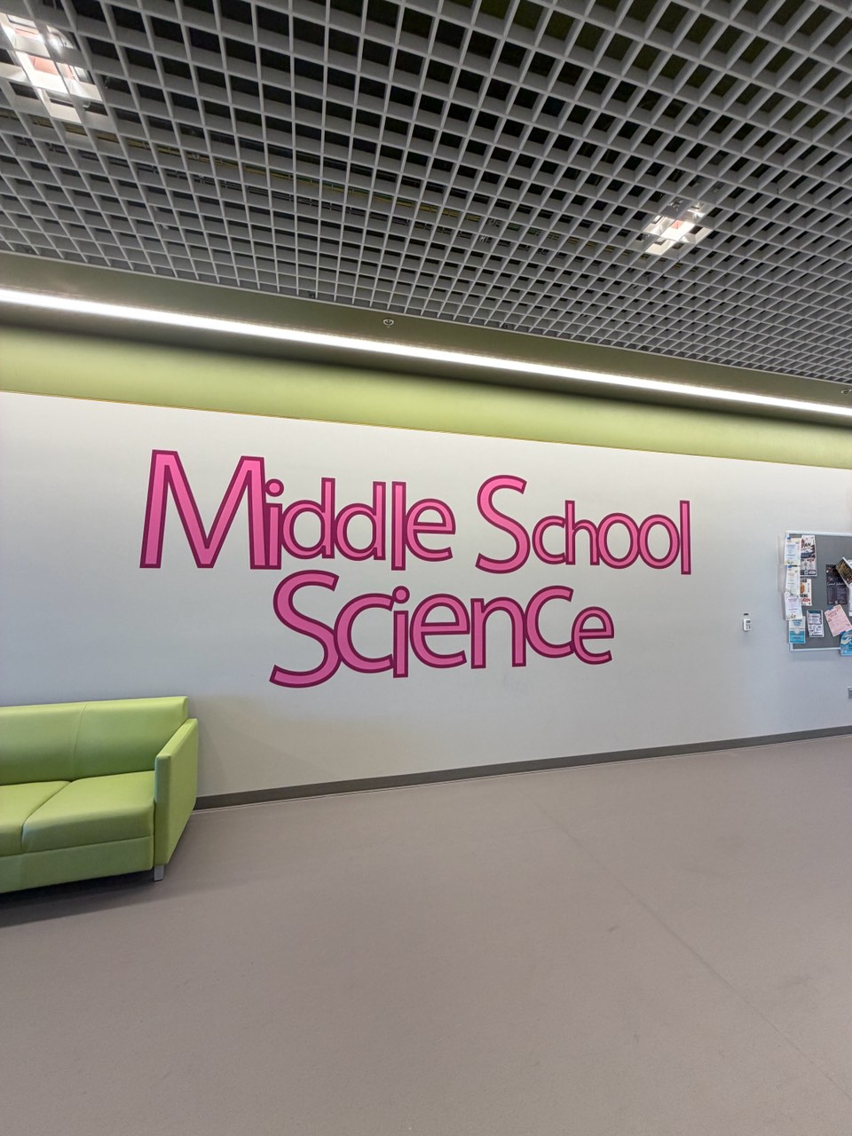 Pink Middle School Science lettering on a school wall