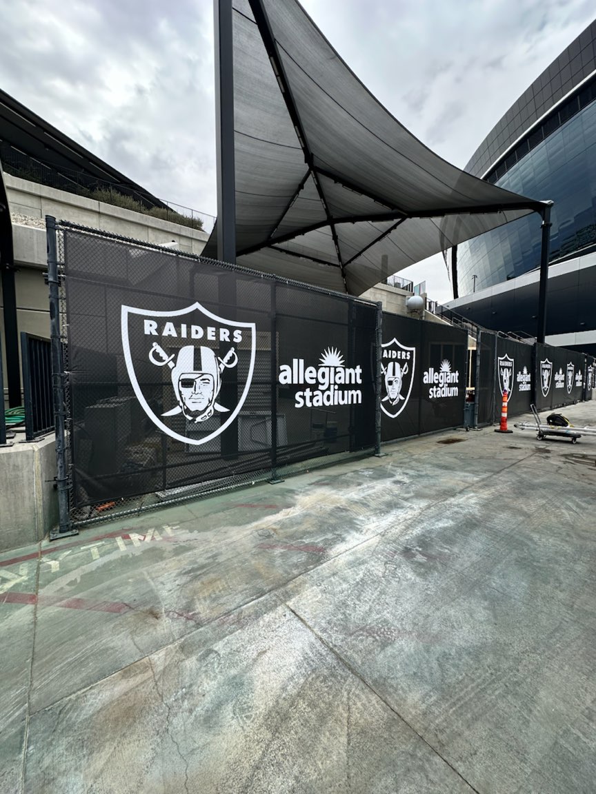 Raiders and Allegiant Stadium branded fence mesh banners