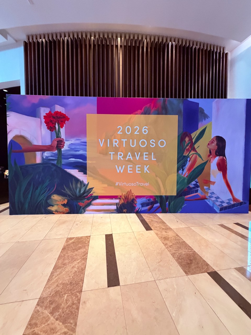 Virtuoso Travel Week 2026 illustrated freestanding wall